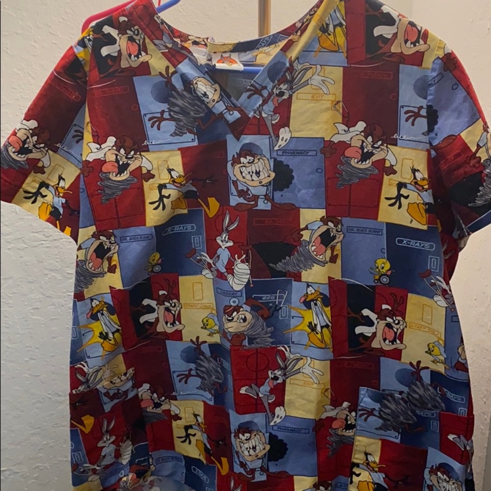 Scrub top looney tunes an matching burgundy pants.